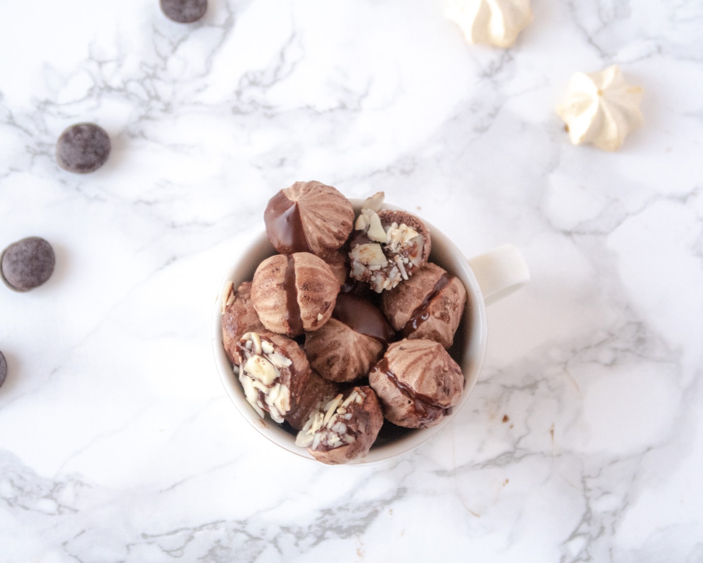 Selection of meringue kisses in a cup