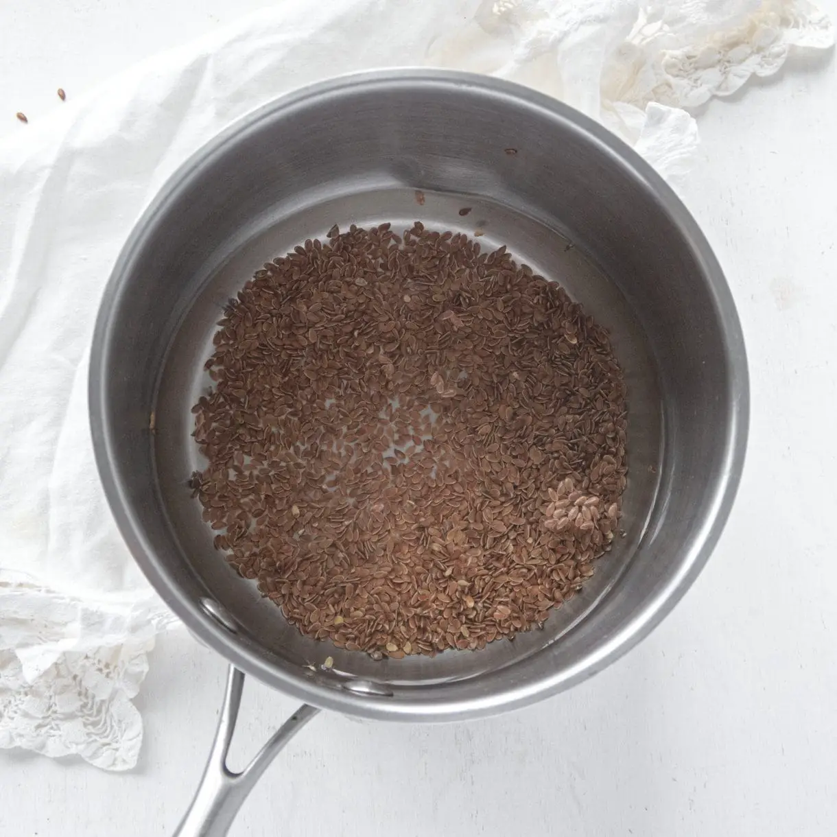 Flaxseed and water in a small saucepan