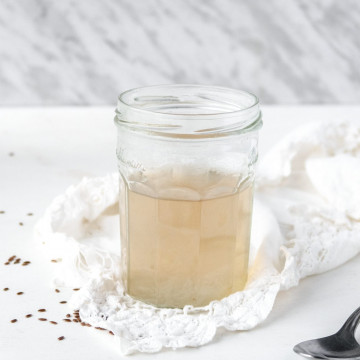 side view of a jar filled with flaxseed gel