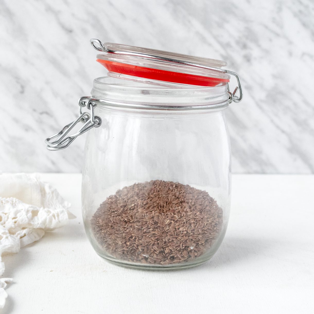 side view of a jar of flaxseeds