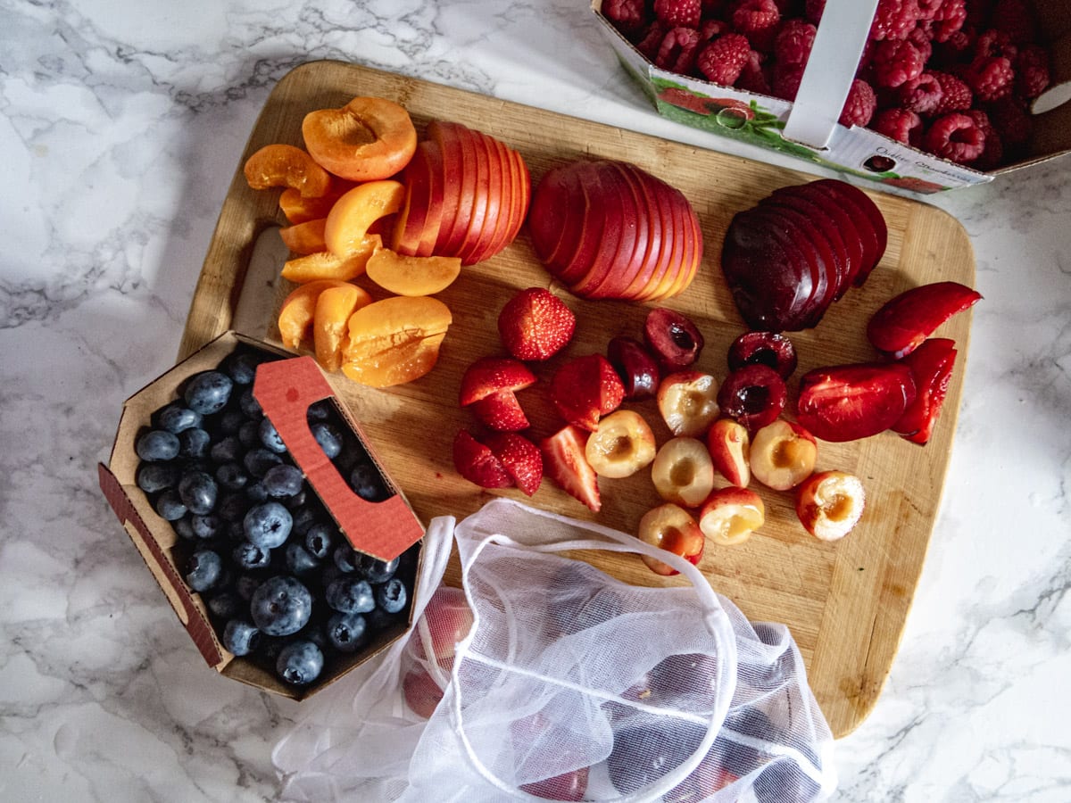 prepped fresh fruit on a cutting board