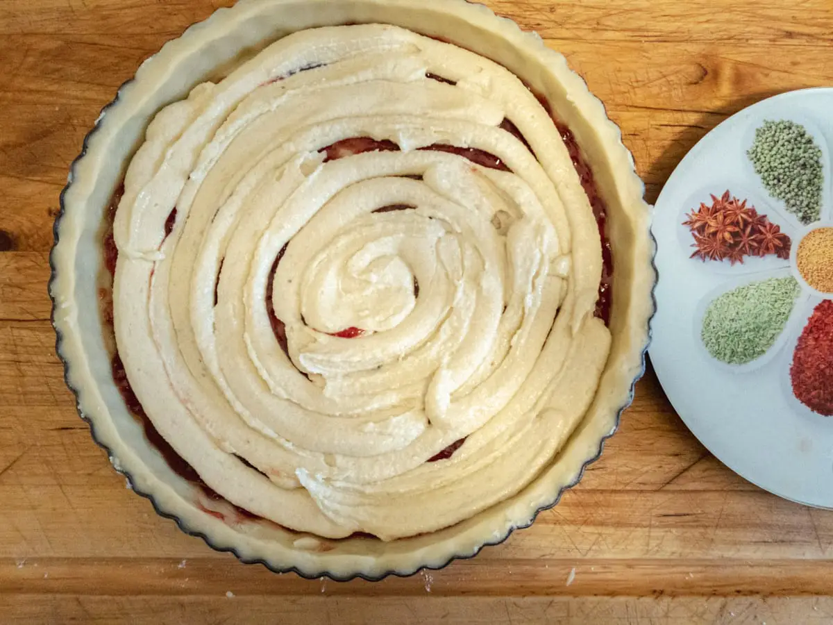 sweet pastry dough in a fluted tart tin