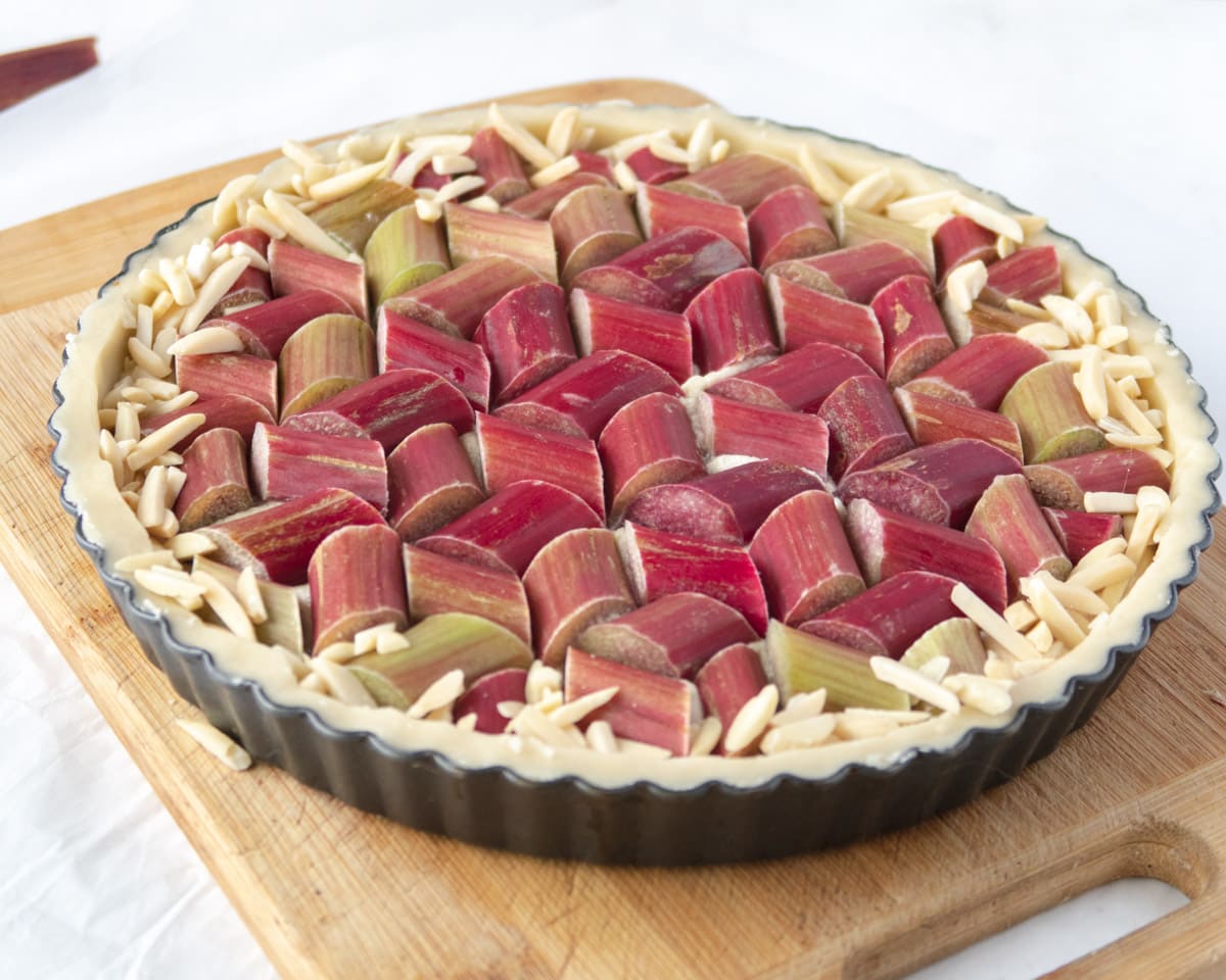 side view of the uncooked strawberry rhubarb vegan tart