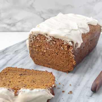 Half sliced vegan bourbon pumpkin bread loaf