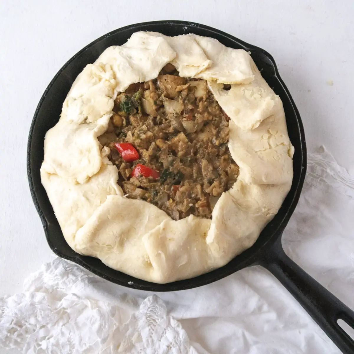 top down view of a curry and vegetable chickpea pie