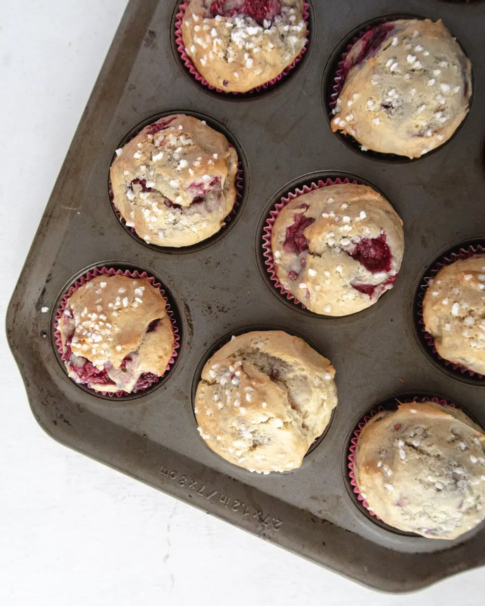 overhead shot of vegan raspberry muffins in a pan