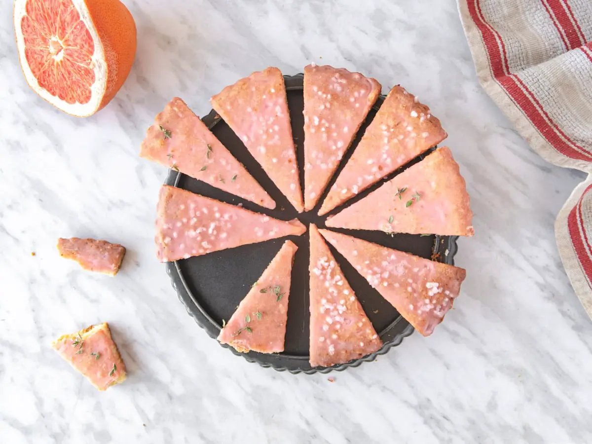 top down view of grapefruit vegan shortbread placed in a circle over a tart pan