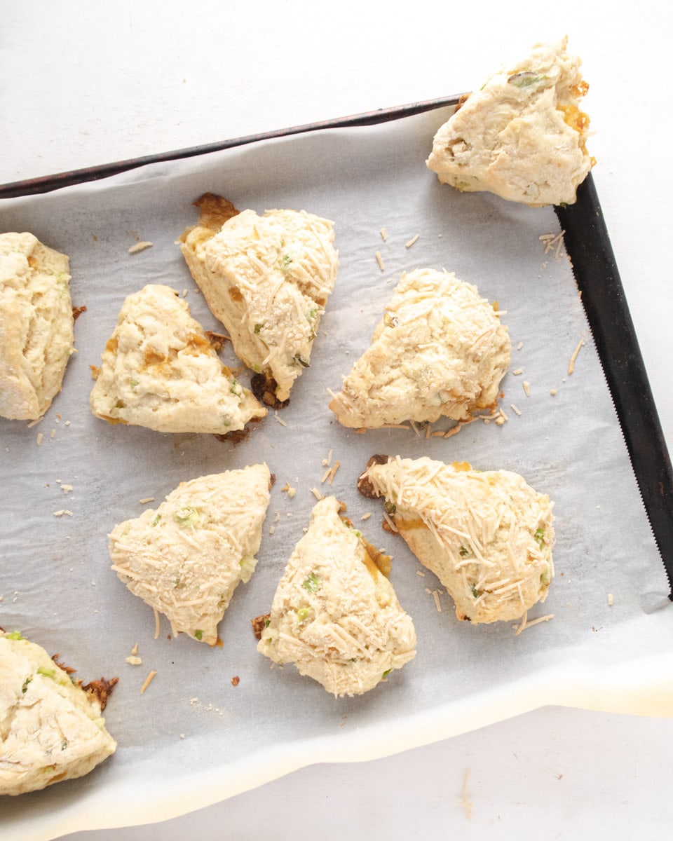 scones placed in a circle on a parchment paper lined baking tray