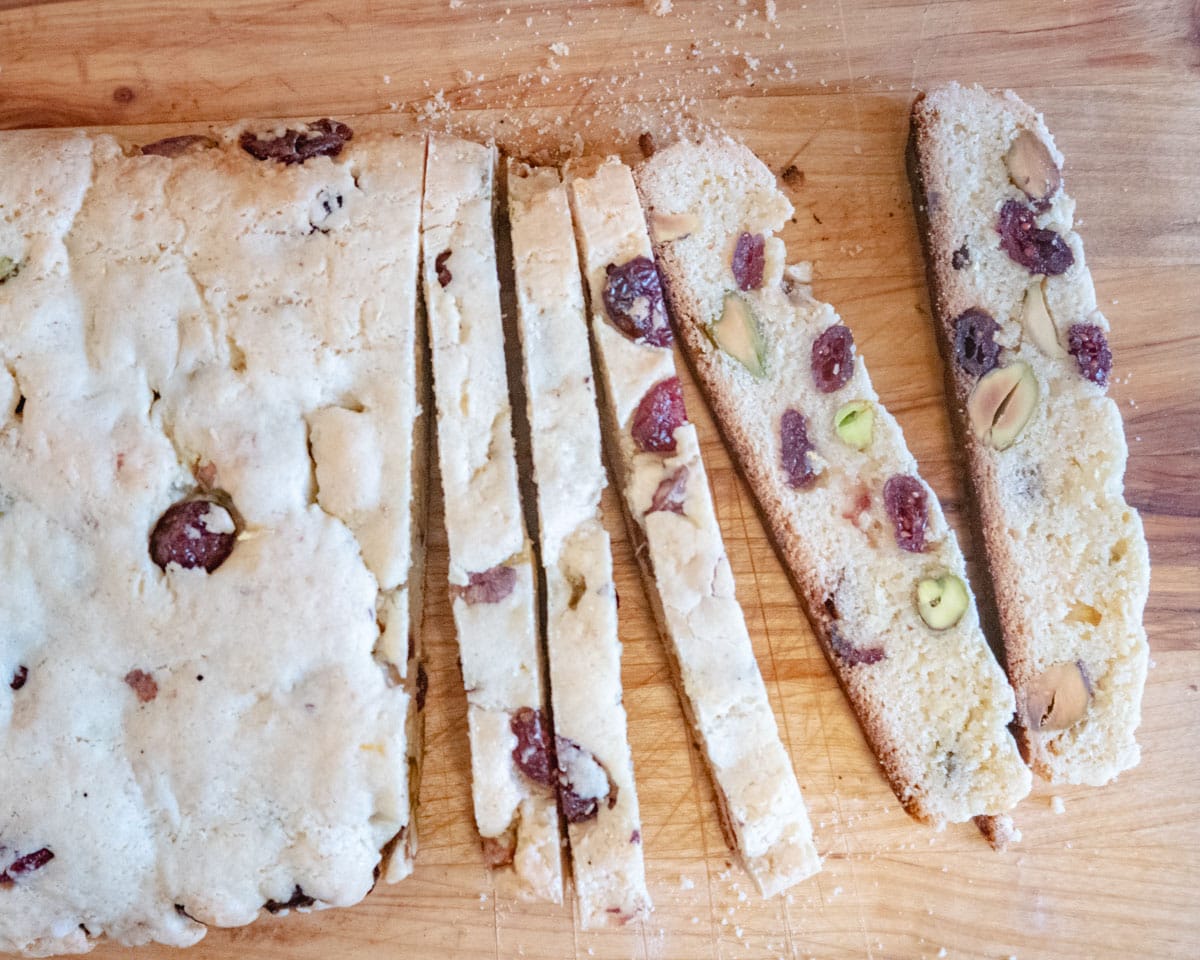 a loaf of vegan biscotti being sliced