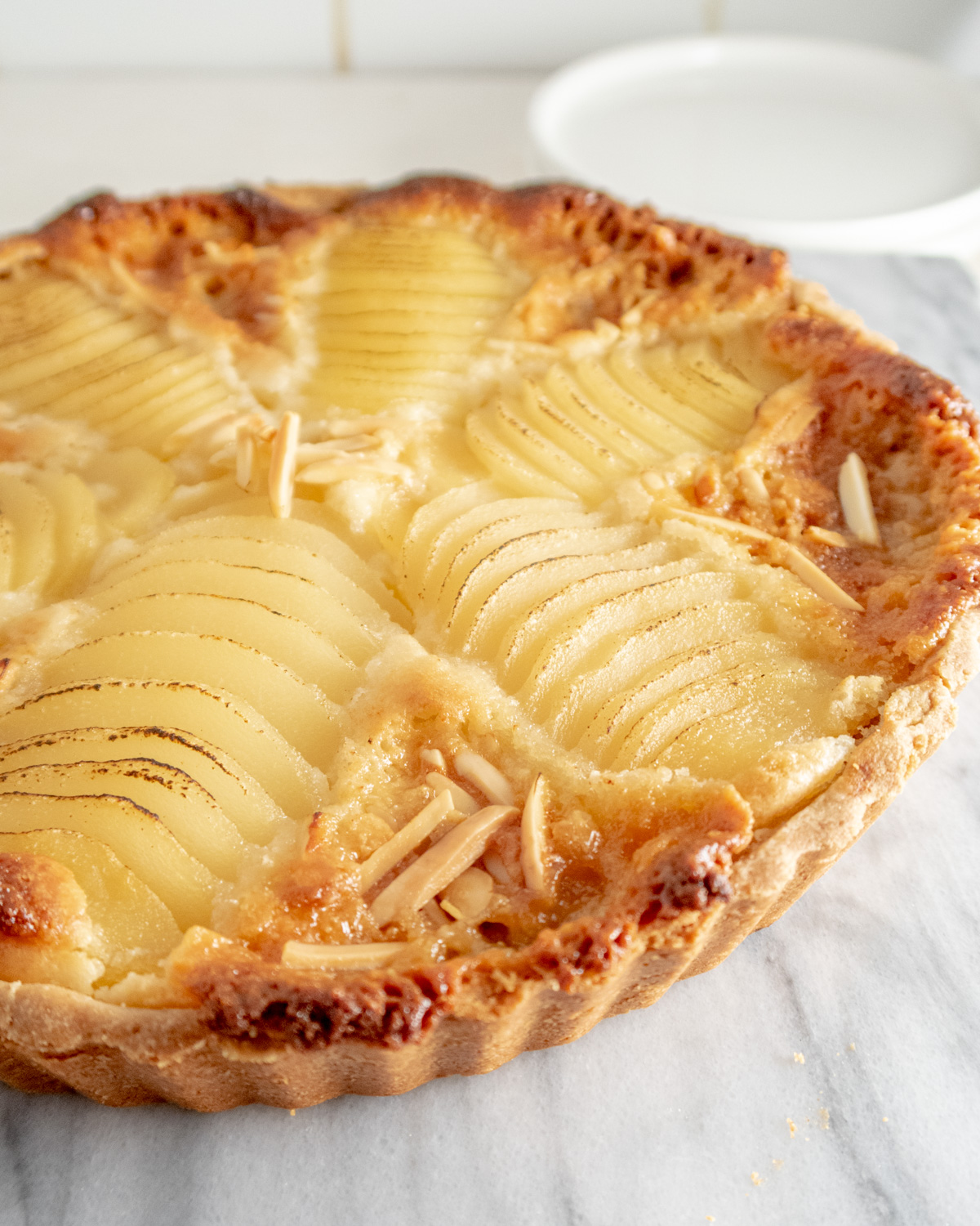 Close up of pear sliced on a vegan Bourdaloue Tart