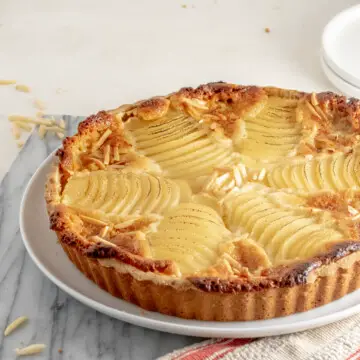 Vegan Bourdaloue Tart on a marble slab.