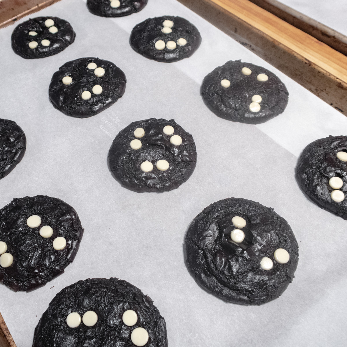 Cookies with chocolate chips placed to make eyes.