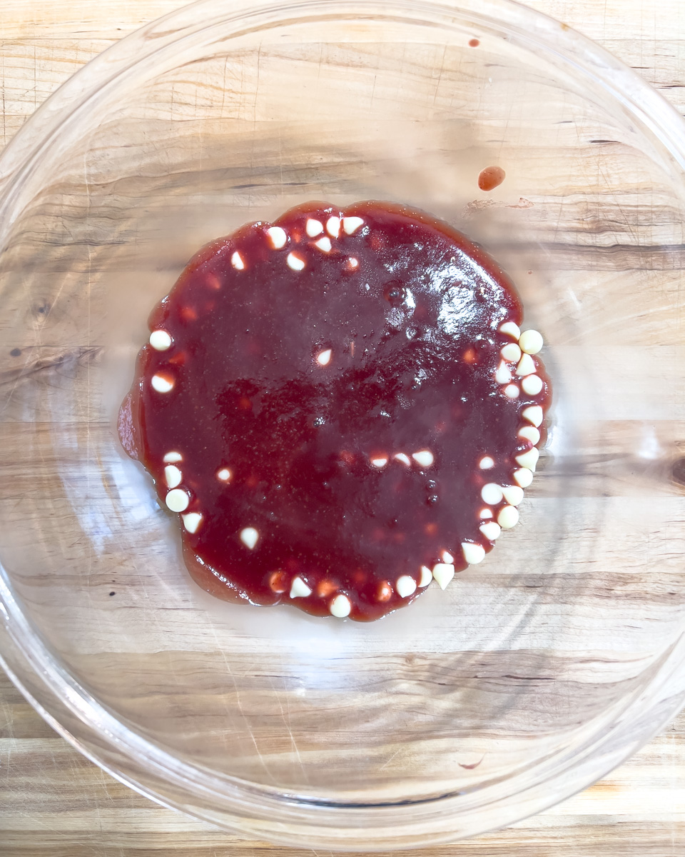 Making strawberry ganache.